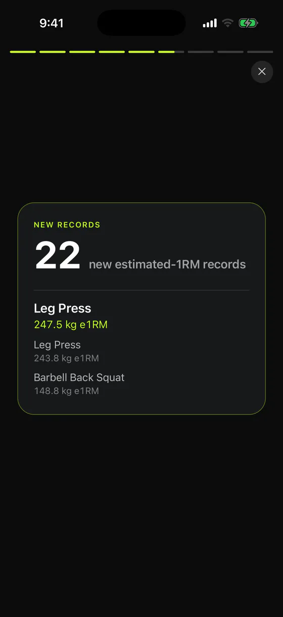 A monthly wrapped slide reporting 22 new estimated-1RM records, with the top three listed underneath.